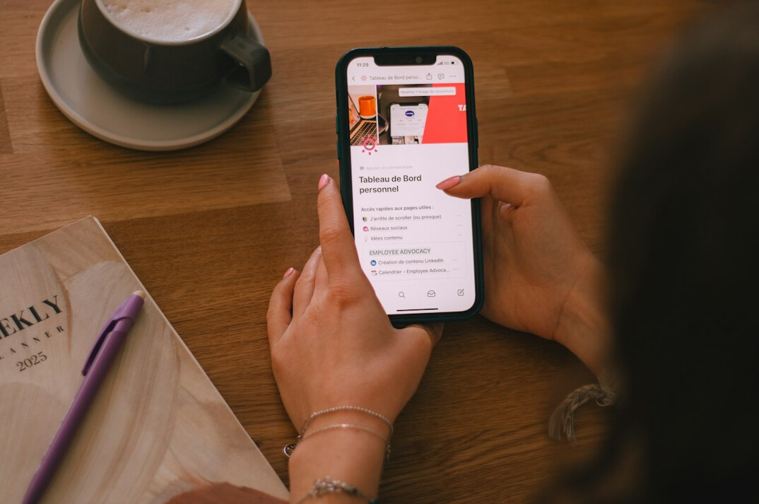 person reading fake news on phone